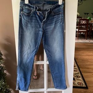 Skinny ankle jeans with zippers on ankles